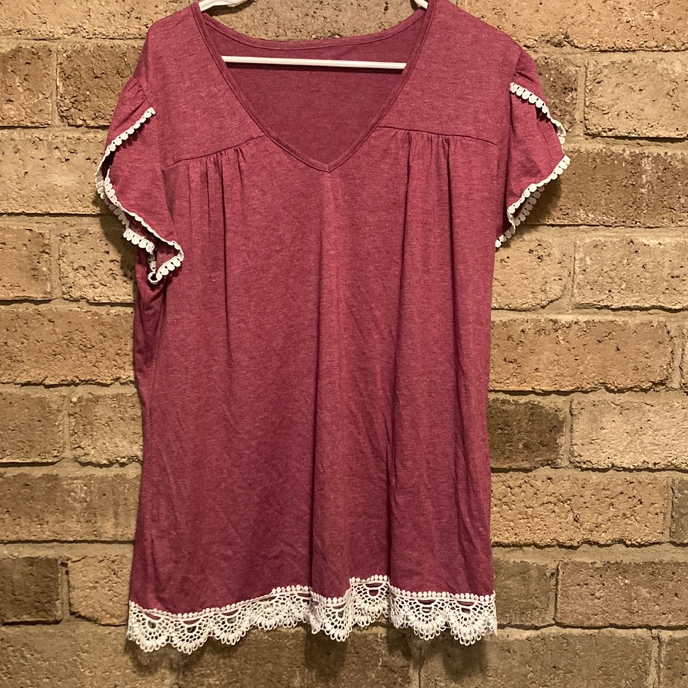 Cute summer top with detailed sleeves and lace